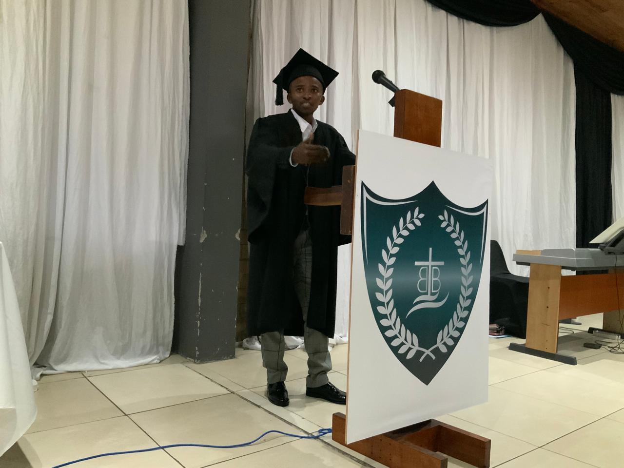 Graduate at Podium